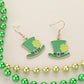 St. Patrick's Day Enamel Leprechaun Hat Dangle Earrings are a festive and fun accessory perfect for celebrating the holiday. Featuring vibrant enamel designs, these earrings showcase a charming leprechaun hat that adds a touch of Irish charm to any outfit. Lightweight and comfortable, they are ideal for parties, parades, or everyday wear during the season.