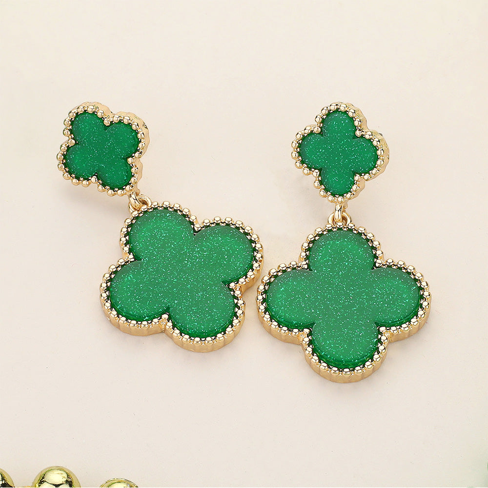 St Patrick's Day Glittered Resin Quatrefoil Dangle Earrings are the perfect accessory to celebrate the holiday in style. Made from high-quality materials, these earrings feature a beautiful quatrefoil design and are adorned with sparkling glitter for a touch of elegance. Add a festive touch to your outfit while showing off your love for St Patrick's Day. 