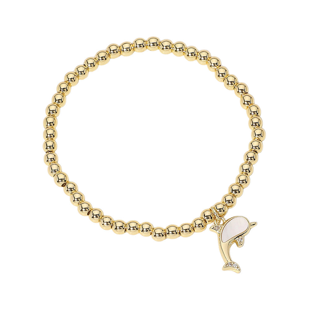 Gold Stainless Steel Ball Mother of Pearl Dolphin Stretch Bracelets features a stretch design, making it easy to put on and take off. The stainless steel ball compliments the beautiful mother-of-pearl dolphin charm for a sleek and sophisticated look. Perfect for any occasion, this bracelet will elevate your style. 