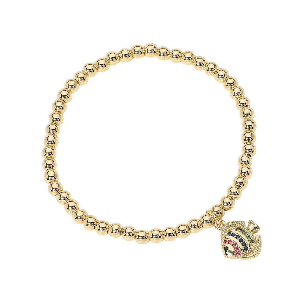 Gold Stainless Steel Ball Stone Paved Fish Charm Beaded Stretch Bracelet features a unique design with fish charm and stone paved beads. The flexible stretch design ensures a comfortable fit. The stainless steel material adds durability and a modern touch to any outfit. Elevate your style with this elegant and versatile accessory. 