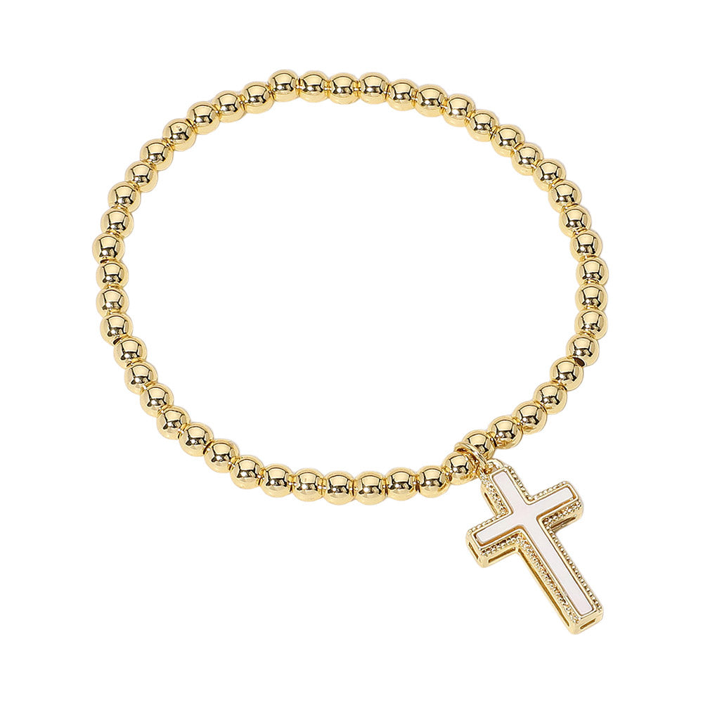 Gold Stainless Steel Ball Mother of Pearl Cross Charm Beaded Stretch Bracelet is made with durable stainless steel balls and features a stunning mother-of-pearl cross charm. The beaded design adds a touch of elegance to any outfit, making it a versatile accessory for both casual and formal occasions. Enhance your style with this beautiful and resilient bracelet.