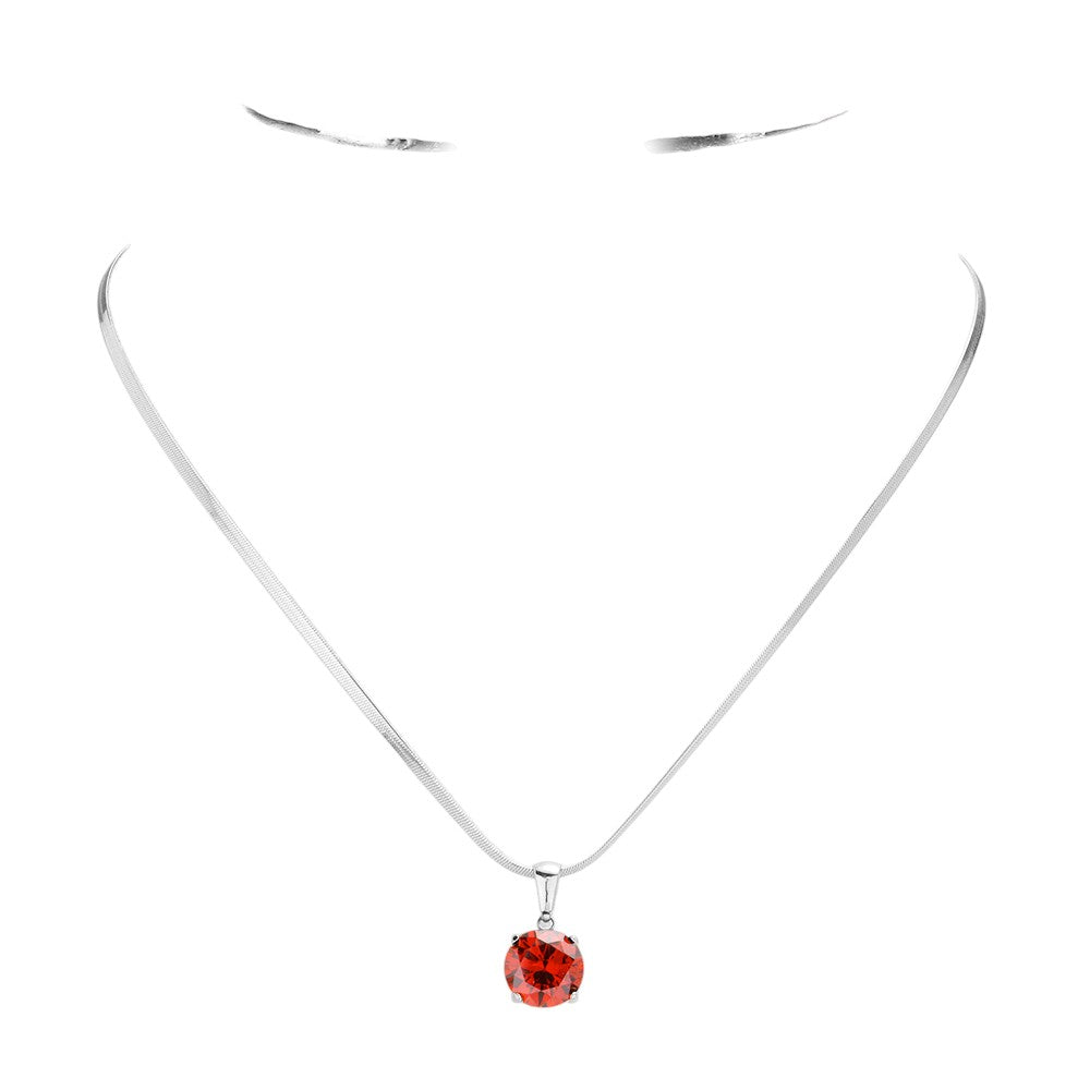 red Stainless Steel CZ Round Pendant Necklace is a stylish and durable accessory. Crafted from high-quality stainless steel, this necklace is resistant to tarnishing and fading. Featuring a sparkling CZ round pendant, it adds a touch of elegance to any outfit. Upgrade your jewelry collection with this timeless piece. 