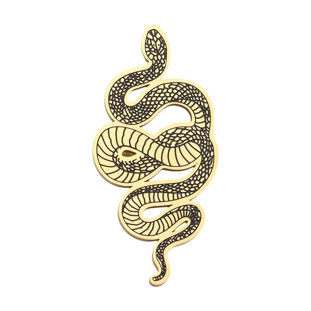 Gold Stainless Steel Snake Pin Brooch is a must-have accessory that will add a touch of edgy elegance to any outfit. Made of durable stainless steel, this brooch is long-lasting and versatile, making it perfect for both casual and formal occasions. Its sleek design and high-quality material make it a great investment for your wardrobe.