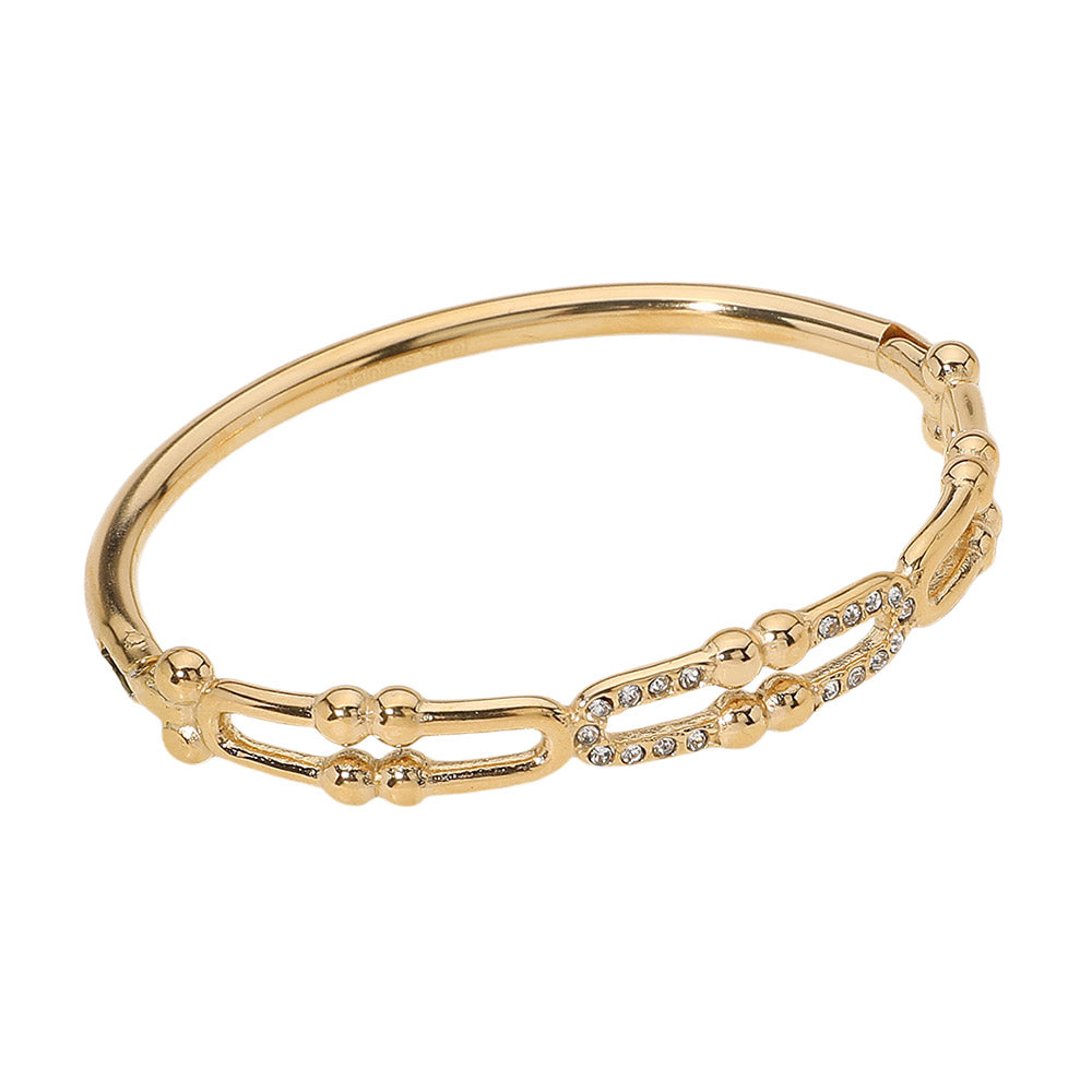 Gold Stainless Steel Stone Paved Abstract Hinged Bangle Bracelet boasts a timeless design and high-quality construction. Made with durable stainless steel and accented with sparkling stones, this bracelet elevates any look. Its hinged closure ensures a secure fit, making it perfect for everyday wear.