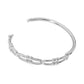 Silver Stainless Steel Stone Paved Abstract Hinged Bangle Bracelet boasts a timeless design and high-quality construction. Made with durable stainless steel and accented with sparkling stones, this bracelet elevates any look. Its hinged closure ensures a secure fit, making it perfect for everyday wear.