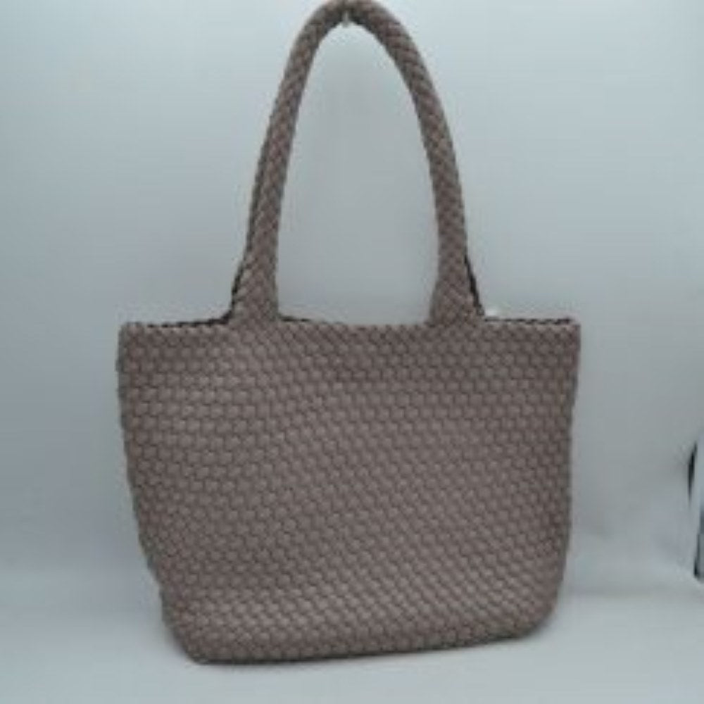 Steel This structured tote bag features an intricate basket-weave design across its body and integrated shoulder straps, creating a textured look suitable for everyday use. The main storage compartment offers a wide, open-top design for easy access to daily essentials. Accompanying the larger bag is a matching smaller pouch with a distinct woven exterior pattern and a secure gold-tone top zipper closure to keep smaller items organized.