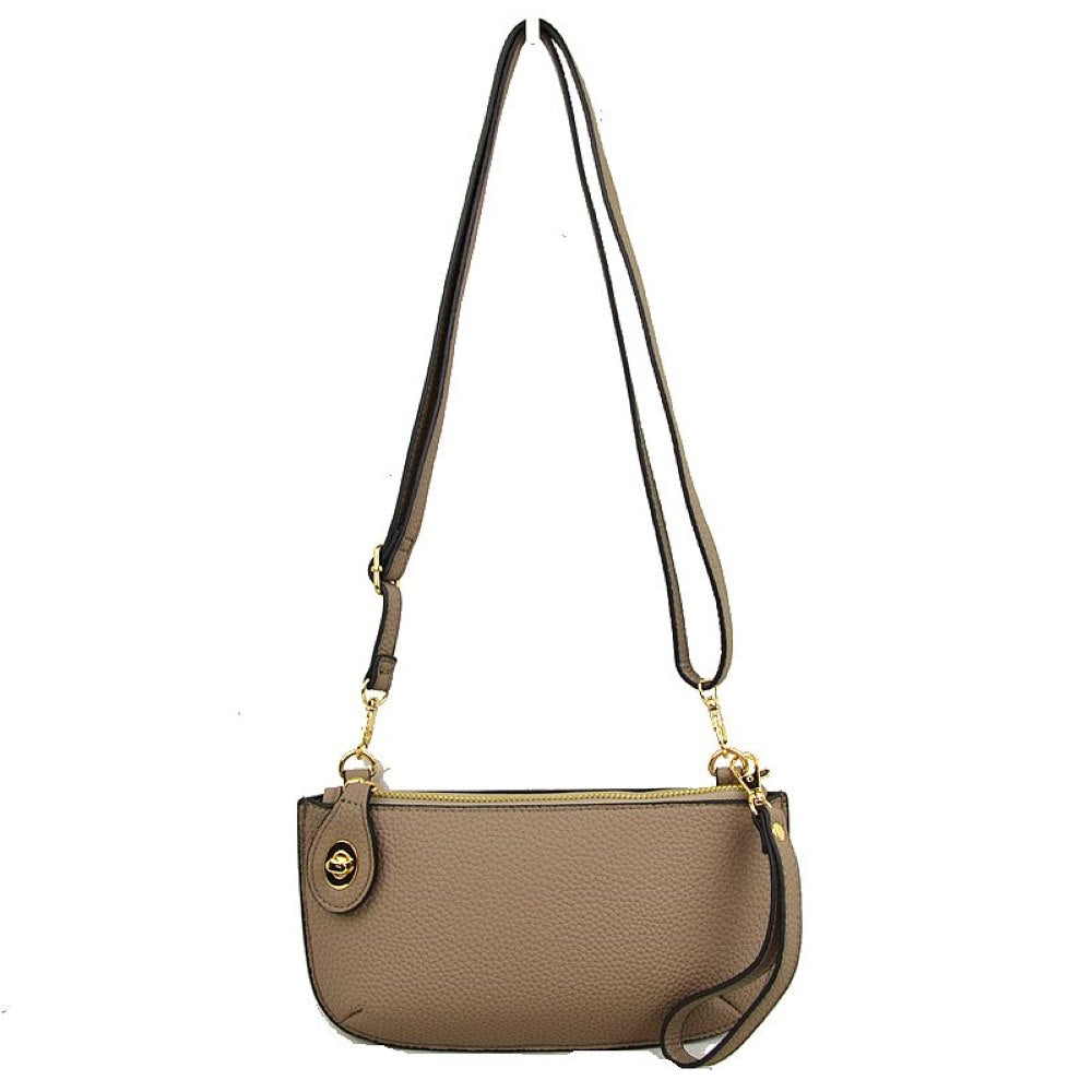 Stone This versatile everyday bag features a compact pebbled textured body with a slightly curved base silhouette. Designed for organized daily or evening use, the main storage compartment is secured by a top zipper closure and accented with a small decorative metallic turn-lock detail on the side panel. It offers multiple carrying options, equipped with a long, adjustable crossbody shoulder strap and a shorter matching wristlet loop