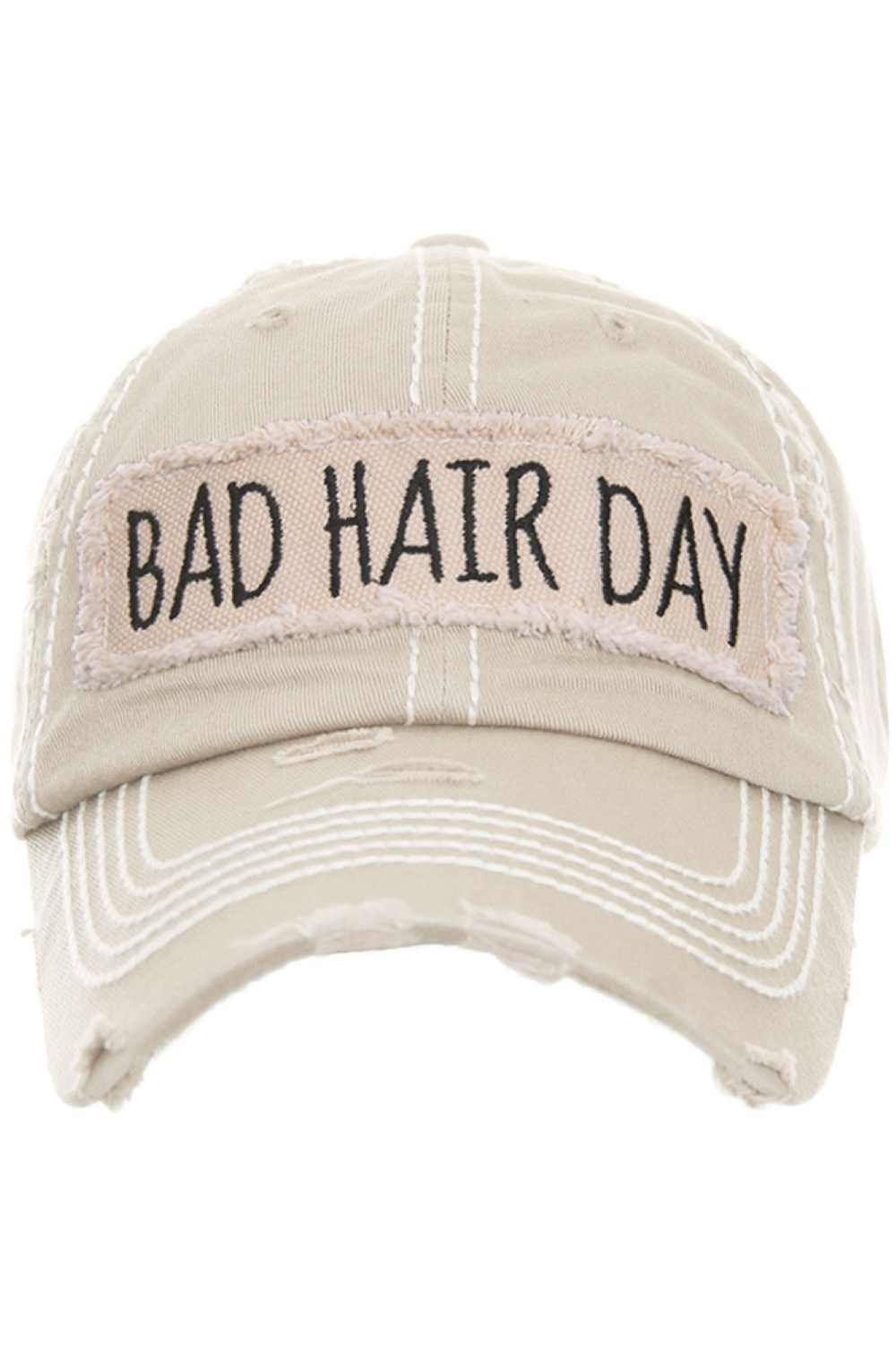 Stone Keep it casual and playful with the BAD HAIR DAY Washed Vintage Baseball Cap, featuring a relaxed, worn-in style that adds personality to any outfit. Designed with a classic curved brim and comfortable fit, it’s the perfect go-to accessory for effortless everyday wear.