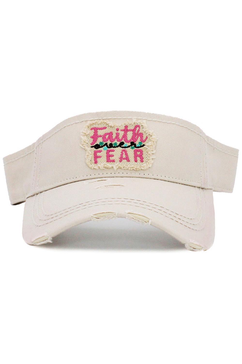 Stone Stay inspired in everyday style with the Faith Over Fear vintage visor cap, featuring a classic distressed finish and uplifting embroidered message. Lightweight and comfortable, this adjustable visor adds a relaxed sporty touch while keeping you cool and confident on sunny days.