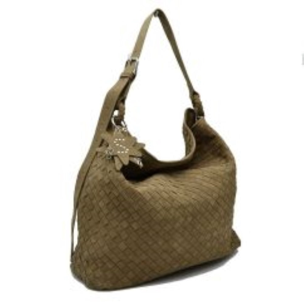 Stone This slouchy hobo bag features a distinctive woven pattern across its exterior, offering a textured and modern look for everyday use. Designed with a spacious main compartment to easily accommodate daily essentials, the bag includes an adjustable flat shoulder strap secured with a metallic buckle for customizable carrying comfort. A decorative star-shaped charm is attached to the side via metallic hardware, adding a unique accent to the overall clean design.