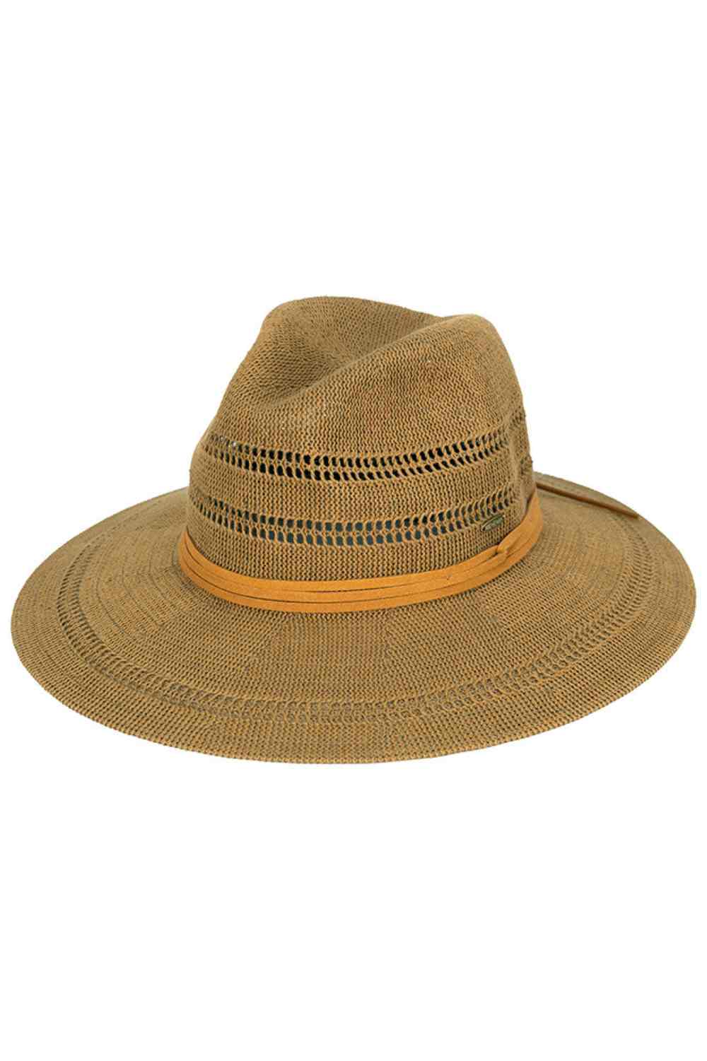 Tan Elevate your sun protection with the C.C Suede Band Knitted Panama Sun Hat. This versatile style features a breathable cotton-polyester blend that keeps you cool and comfortable all day long. The classic panama silhouette is enhanced with a sophisticated suede band detail, adding an upscale touch to any warm-weather outfit. Designed for a universal fit with a 22.6" circumference, this hat offers a 3.5" brim for reliable sun coverage and a 4" crown for a flattering shape. Whether you're heading to the be
