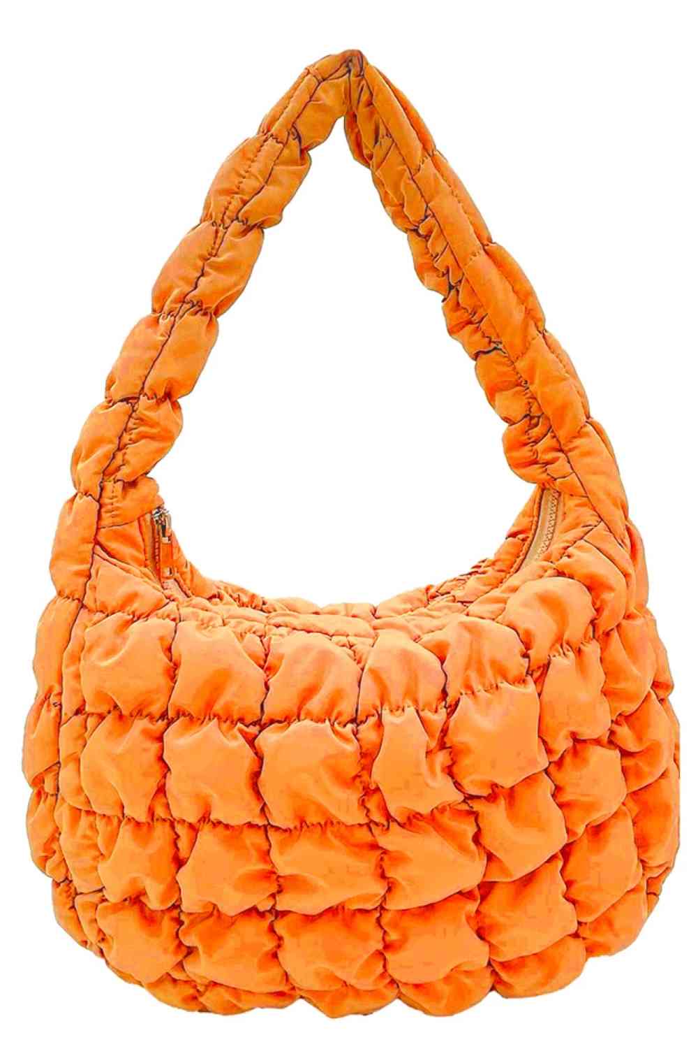 Tangerine Compact quilted bag crafted from durable 100% polyester with a timeless solid design. Measuring 8.7" x 11.8" x 3.15", it's the perfect size for everyday essentials, travel accessories, or as a versatile organizer. The quilted texture adds visual interest and subtle structure. Ideal for on-the-go convenience with a sleek, minimalist aesthetic that pairs effortlessly with any outfit.
