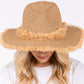 Taupe Frayed Band and Trip Straw Sun Hat combines style and practicality. The frayed band adds a touch of texture, while the trip straw material provides superior sun protection. Perfect for a day at the beach or a stroll in the park, this hat will keep you both fashionable and protected.