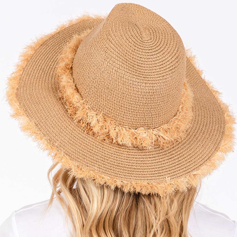 Taupe Frayed Band and Trip Straw Sun Hat combines style and practicality. The frayed band adds a touch of texture, while the trip straw material provides superior sun protection. Perfect for a day at the beach or a stroll in the park, this hat will keep you both fashionable and protected.