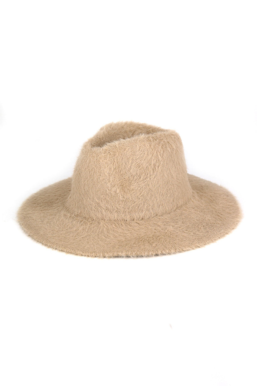 Taupe Fuzzy Palin Solid Winter Fedora Hat merges classic silhouette with cold-weather functionality. Constructed with premium insulating materials, this fedora maintains structural integrity while providing superior warmth. The textured exterior offers both thermal protection and sophisticated styling, while the traditional brim provides practical shielding from winter elements. Designed for discerning individuals who refuse to compromise style for seasonal practicality.