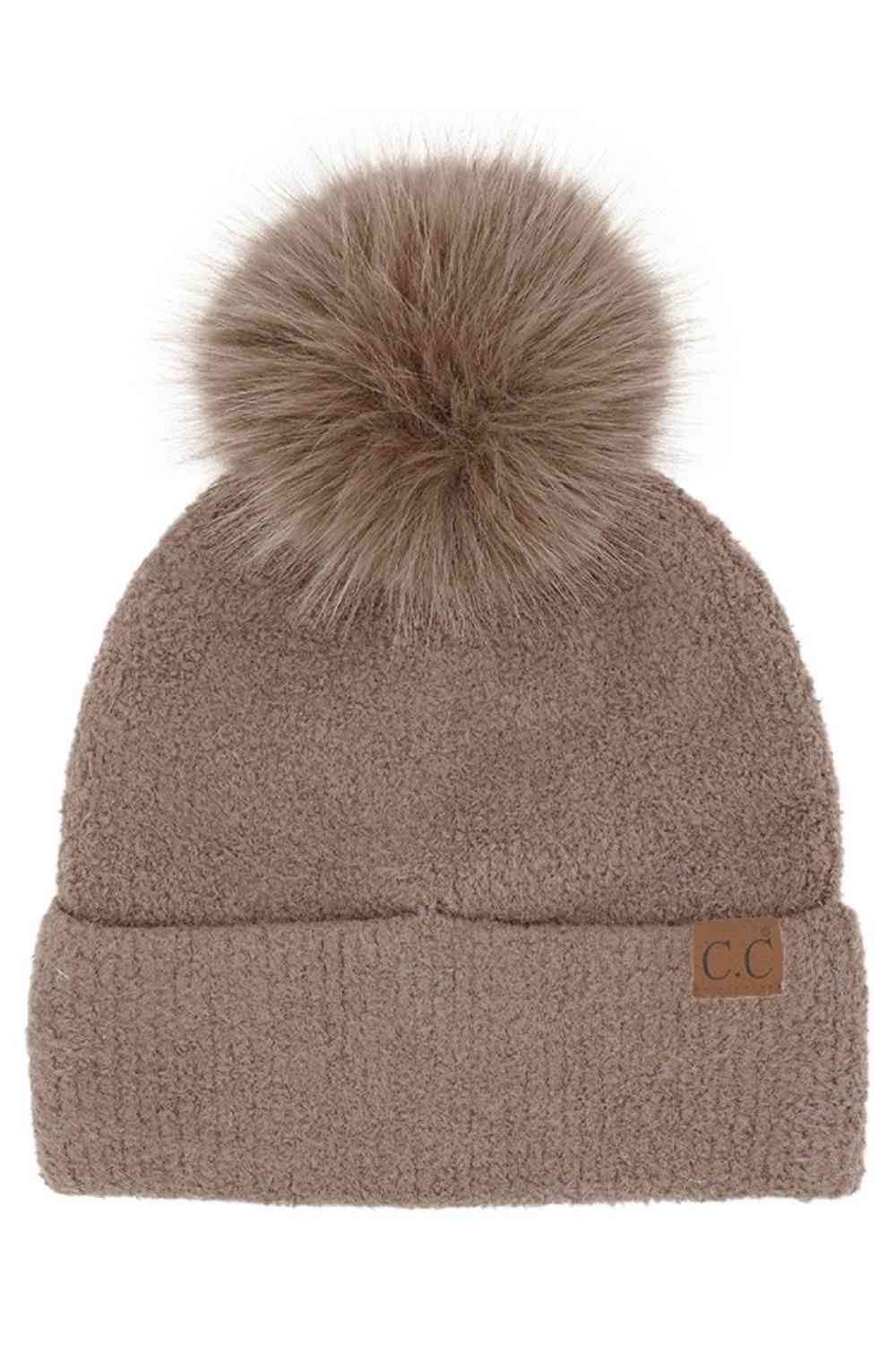 Taupe C.C Plush Terry Chenille Pom Beanie Winter Hat&nbsp;combines superior thermal protection with refined style. Constructed from premium terry chenille fabric, this hat delivers exceptional insulation while maintaining breathability. The distinctive pom accent adds visual interest without compromising functionality. Designed with precise dimensions to ensure optimal coverage of ears and forehead, this cold-weather essential maintains its structural integrity throughout extended wear.