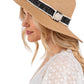Taupe Tweed with Pearl Band Summer Straw Sun Hat delivers exceptional structural resilience with optimal weight distribution. The pearl band features precisely calibrated pearl-to-space ratios that create visual rhythm while reinforcing the critical crown-brim transition. The brim architecture incorporates a multi-density weave that maintains dimensional stability in variable humidity while offering comprehensive UV protection with a calculated 8.5-degree downward angle. 