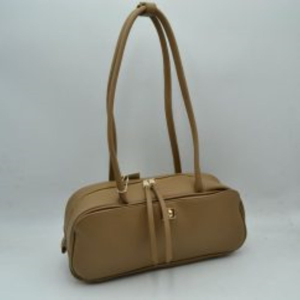 Taupe This structured shoulder bag features a smooth, elongated silhouette with a clean exterior finish, making it an excellent choice for modern everyday use. The design stands out with long, rounded double top straps that loop over the main body for comfortable carrying on the shoulder or by hand. It is equipped with a secure top zipper closure featuring dual long pulls