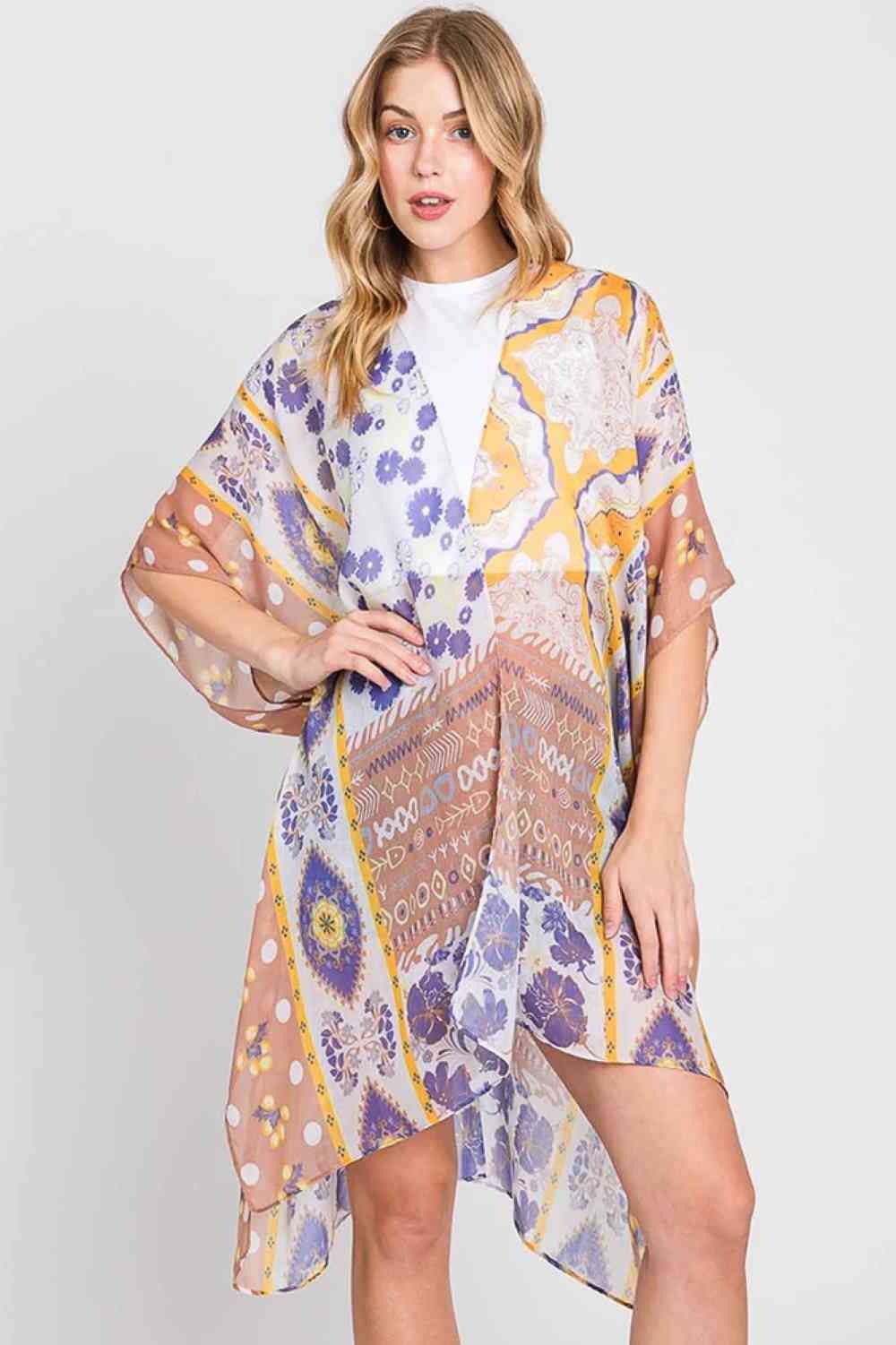 Taupe Embrace effortless elegance with this Boho Flower Print Kimono. Featuring a vibrant floral design that captures free-spirited style, this lightweight piece drapes beautifully over any outfit. Crafted from 100% polyester for easy care and lasting comfort, it's perfect for layering on warm days or adding a bohemian touch to your wardrobe. Generously sized at 35" x 36", it offers a relaxed, flowing fit that flatters all body types. An essential piece for anyone seeking laid-back, artistic style.