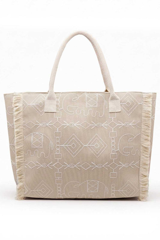 Taupe Carry your essentials in bohemian style with this eye-catching tote bag. Featuring a vibrant geometric and elephant print design accented with playful fringe detailing, it's the perfect accessory for everyday adventures or weekend getaways. Crafted from durable 100% polyester, this spacious tote measures 21" x 14.25" x 5" and includes a secure zipper closure to keep your belongings safe. An inner pocket provides convenient organization for smaller items. Whether you're heading to the market, beach, or