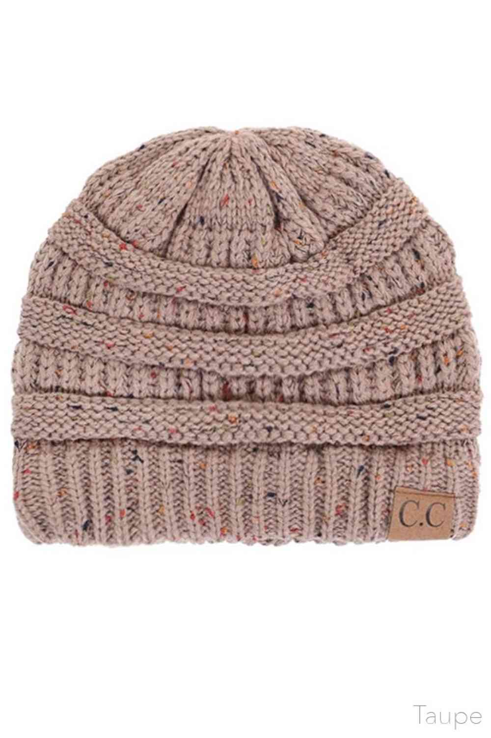 Taupe Stay warm with timeless style in this C.C Confetti Cable Knit Beanie. Crafted from 100% soft acrylic, the classic cable knit texture provides excellent insulation while maintaining breathability for all-day comfort. The playful confetti detailing adds visual interest to this versatile essential. Lightweight yet durable, this beanie transitions seamlessly from casual outings to outdoor adventures, making it a reliable choice for any season.