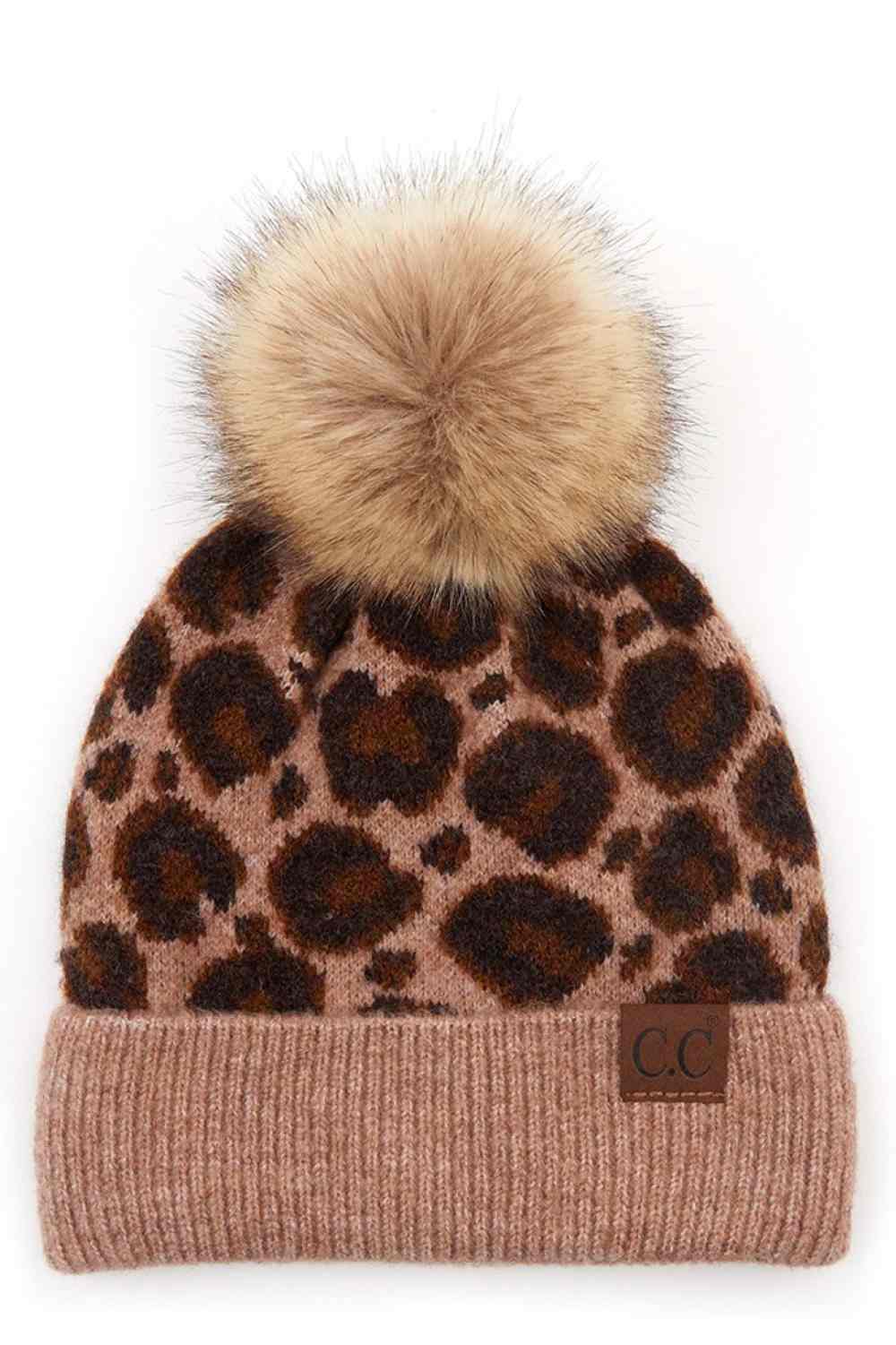 Taupe Stay cozy with this C.C Leopard Knit Beanie, featuring a playful pom-pom on top. Made from a thoughtful blend of 50% acrylic, 30% wool, and 20% nylon, this beanie combines warmth and durability for winter days.