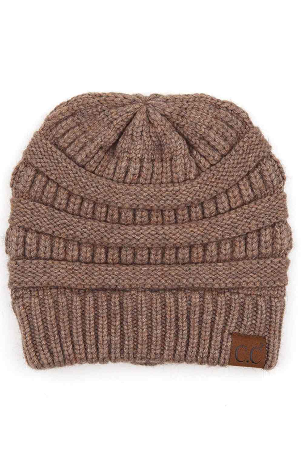 Taupe Wrap yourself in softness with this C.C Soft Yarn Knit Beanie, crafted from a premium blend of 47% rayon, 31% PBT, and 22% nylon. The luxurious rayon provides a silky feel against your skin, while the durable synthetic fibers ensure lasting wear through winter season.