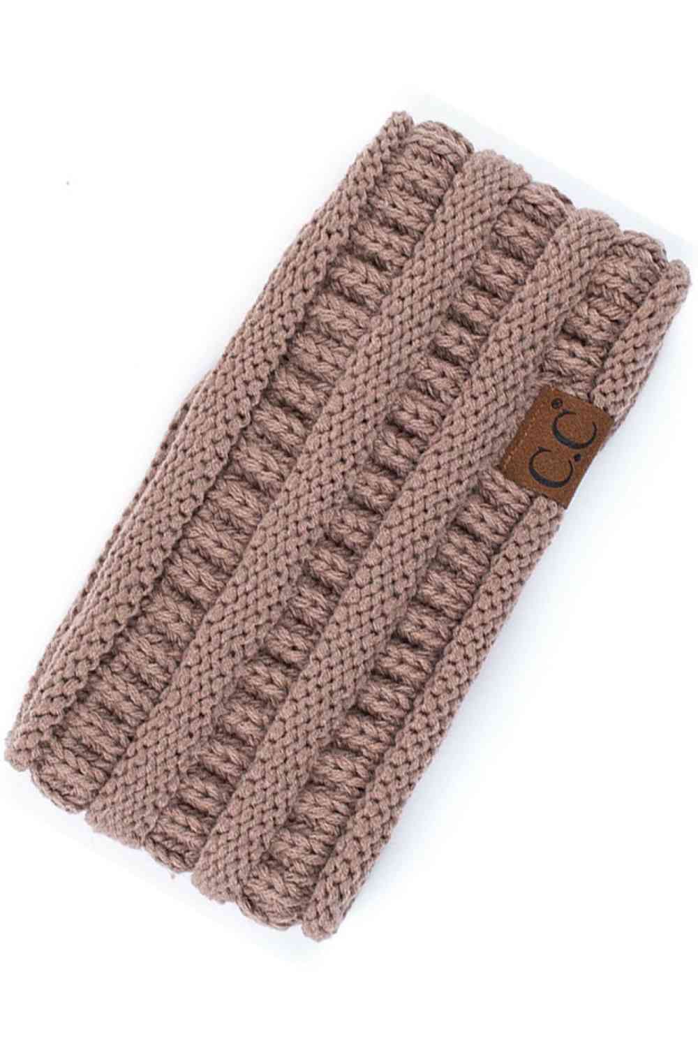 Taupe Elevate your everyday style with the C.C Solid Ribbed Headwrap. Crafted from 100% acrylic, this versatile headwrap features a classic ribbed texture that adds dimension and visual interest. One size fits most, making it the perfect accessory for any occasion—whether you're running errands, hitting the gym, or making a fashion statement. Made in Korea with quality craftsmanship you can trust. Comfortable, durable, and effortlessly chic.