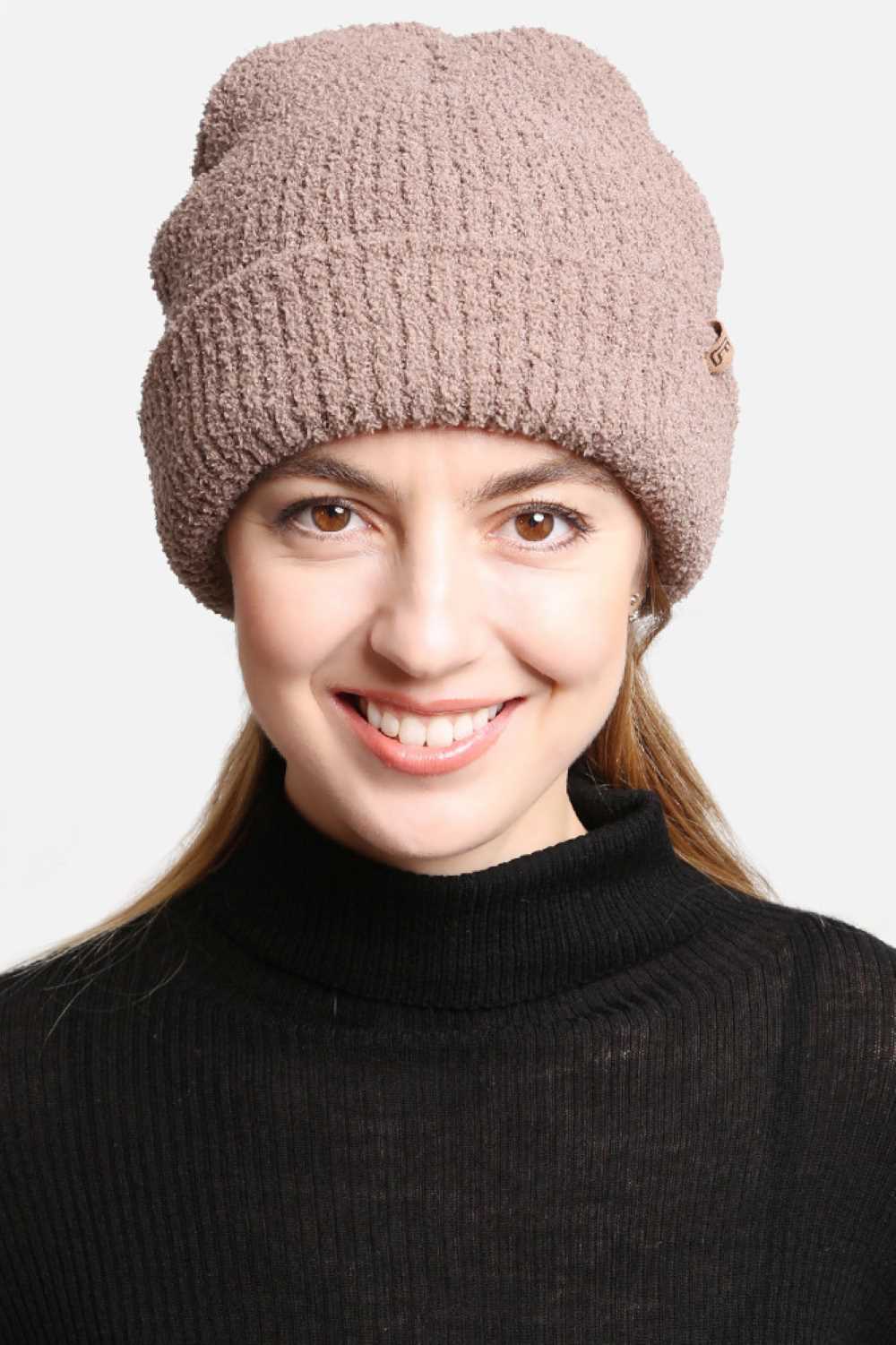 Taupe Double Layered Solid Beanie features a clean, minimalist design with double-layer construction for extra warmth and insulation on cold days. Crafted with a soft stretch fit, it delivers cozy comfort while keeping your winter style effortlessly simple.