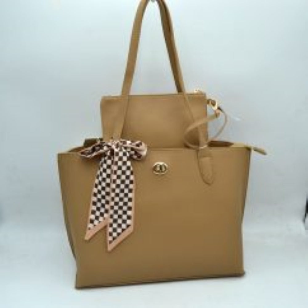 Taupe This structured tote bag features a smooth silhouette with a clean exterior, making it a highly functional choice for versatile everyday use. The front panel is detailed with a polished oval center accent and a decorative checkered scarf tied around the base of one of the long, flat shoulder straps designed for comfortable carrying. This set includes a spacious main storage compartment secured by a top zipper closure