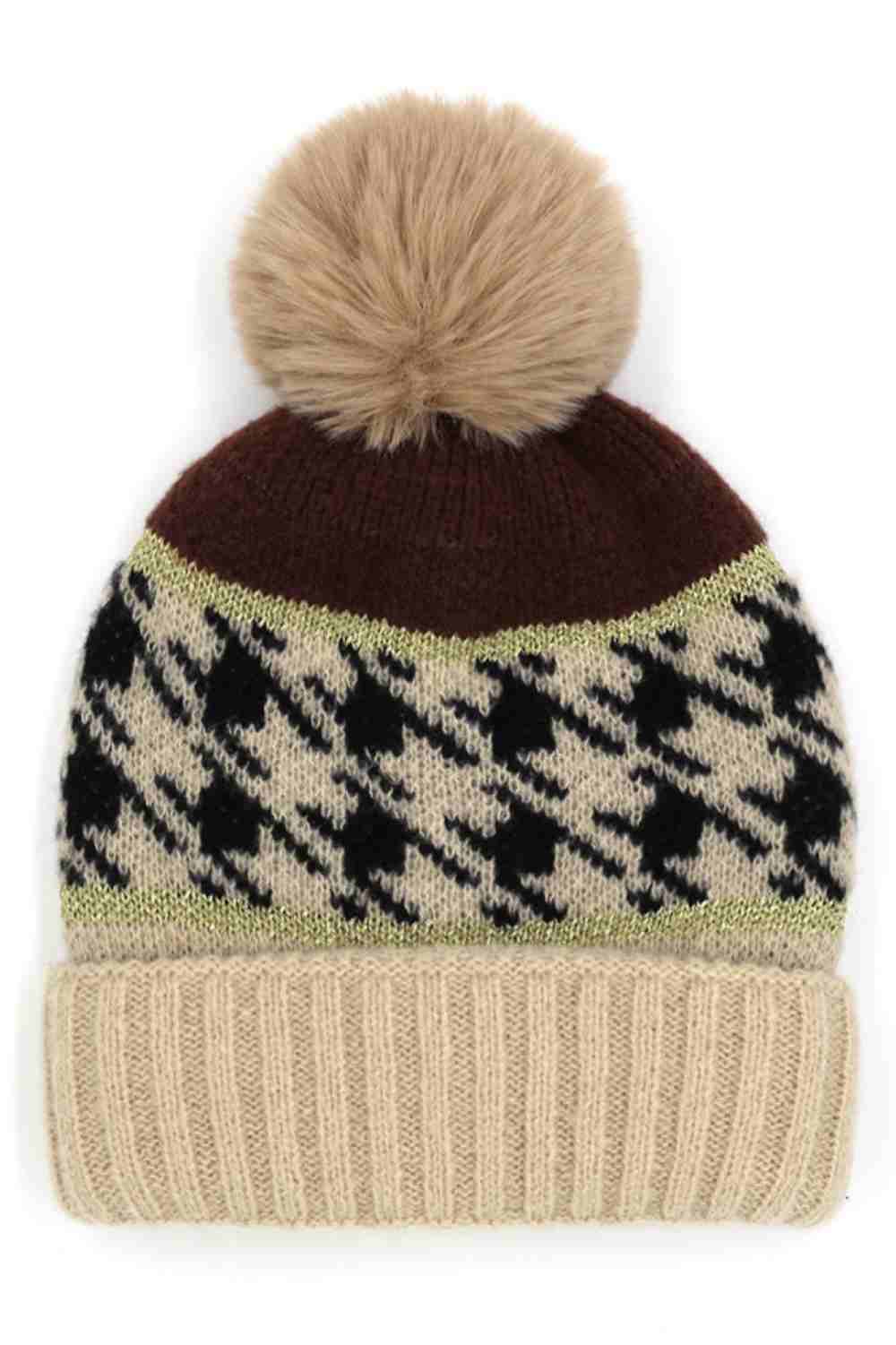 Taupe Houndstooth PomPom Beanie features a classic houndstooth knit pattern topped with a fluffy pom for a stylish, winter-ready look. Finished with a soft stretch fit, it keeps you warm and comfortable while adding timeless charm to your cold-weather outfits.