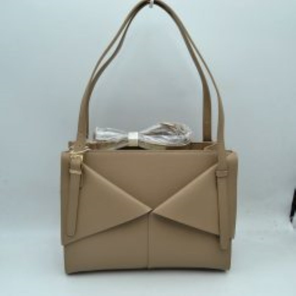 Taupe Make a sharp, modern impression with this beautifully architectural rectangular tote bag. Defined by its unique front panel detailing, it features overlapping angled overlays that mimic the sleek lines of a classic envelope flap. Crafted with a smooth matte finish and a highly structured silhouette, this handbag sits securely upright on a flat base, maintaining its clean lines all day long. It comes equipped with extra-long, adjustable top handles for comfortable over-the-shoulder wear