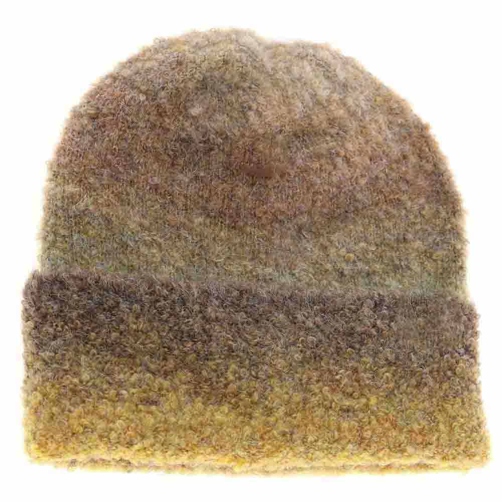 TaupeMix Multi-colored Slouchy Mohair Cuffed C.C Beanie combines the softness of mohair with a stylish, relaxed fit. Its vibrant multi-colored design adds a modern touch, while the cuffed edge ensures a secure and comfortable wear. Perfect for cooler weather, this beanie offers lightweight warmth without bulk, making it an ideal accessory for both casual outings and urban layering. Crafted for durability and style, it’s a versatile choice for those who appreciate quality knitwear.