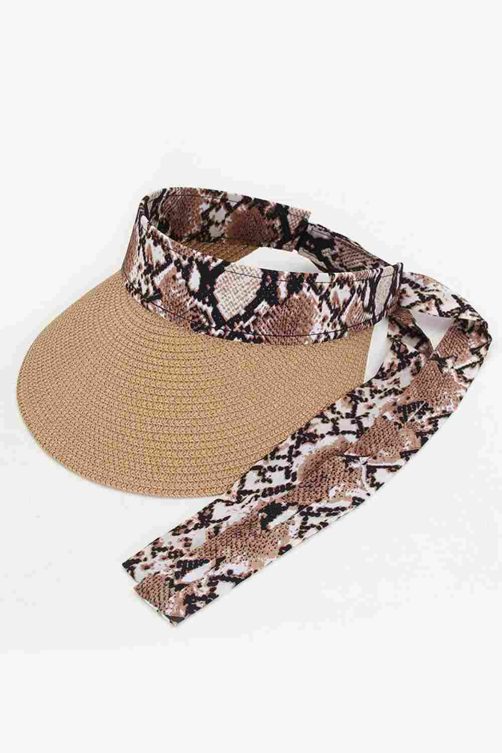 Taupe Add a chic summer touch with the Snake Pattern Bow Straw Visor Cap, featuring a stylish snake-print accent and cute bow detail for a standout look. Lightweight and comfortable with an adjustable fit, this breathable straw visor is perfect for beach days, outdoor outings, or sunny casual wear.