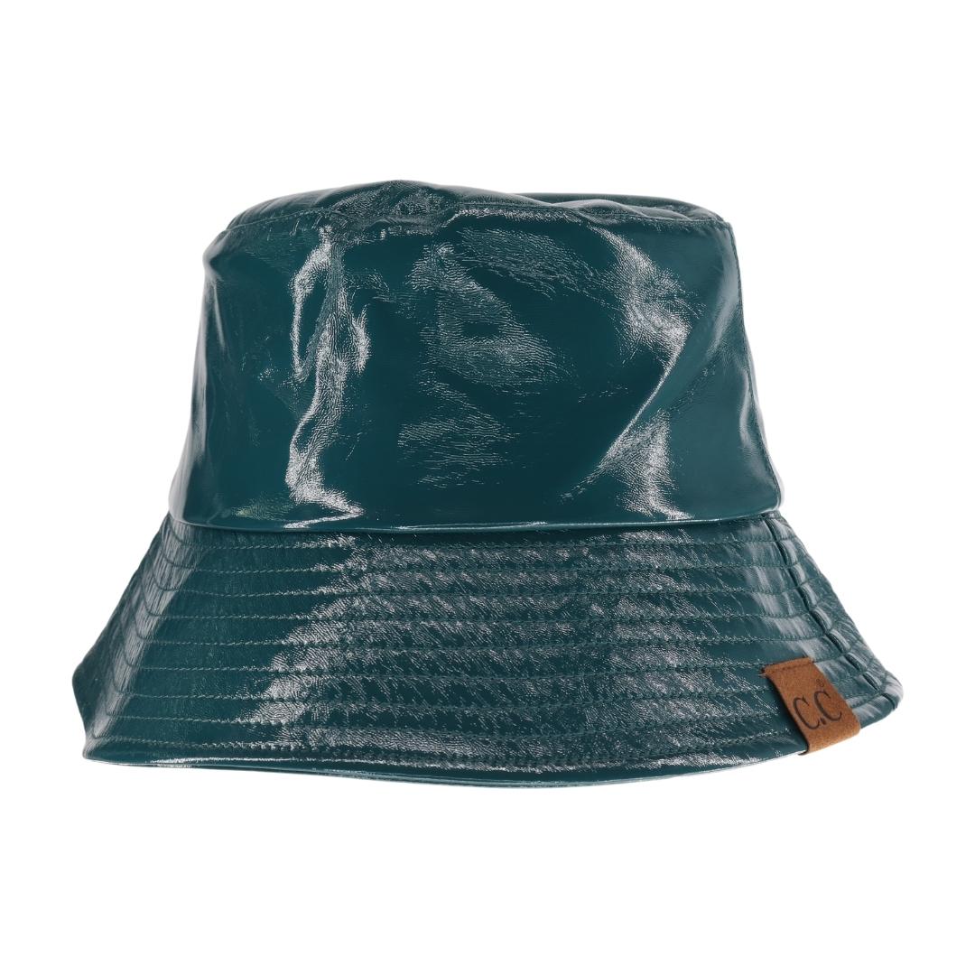 Teal C.C Vegan Leather Bucket Hat offers a stylish and cruelty-free option for sun protection. Made from premium vegan leather, this hat provides both fashion and functionality. Keep your head cool and protected while making an ethical choice.