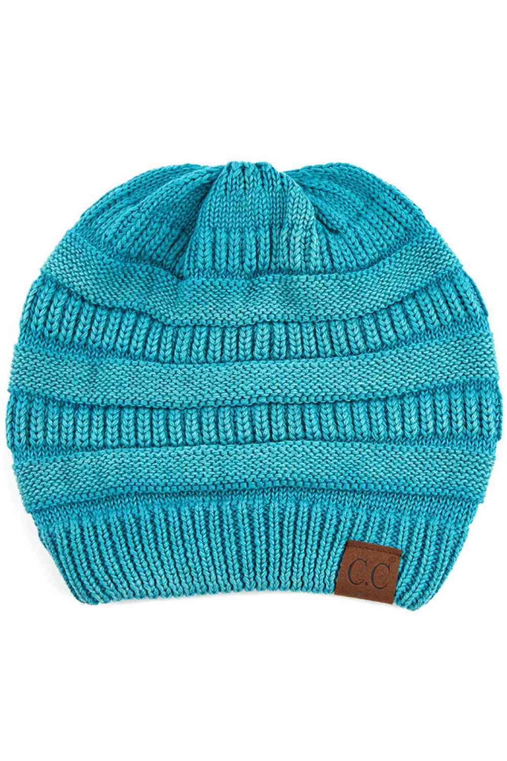 Teal The C.C Cotton Washed Ribbed Beanie combines soft comfort with timeless style. Crafted from a premium blend of 50% viscose, 30% polyester, and 20% nylon, this beanie offers warmth and breathability for everyday wear.