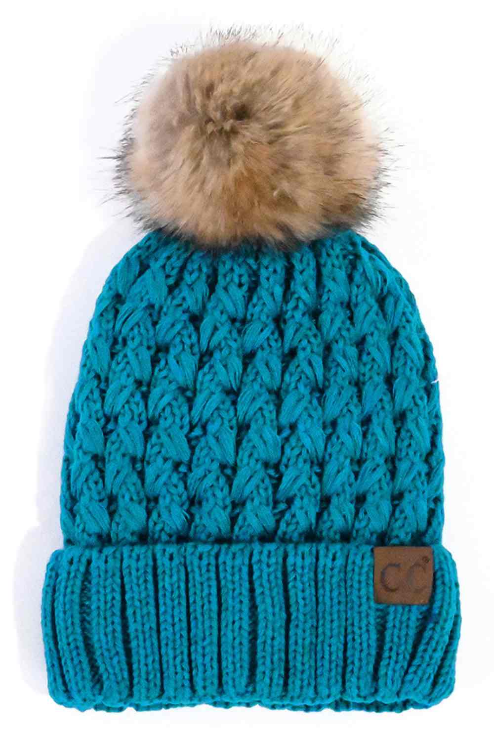Teal Elevate your winter wardrobe with the C.C Lattice Crossover Stitch Beanie, featuring an intricate lattice pattern and cozy pom detail. Crafted from 100% soft acrylic, this beanie delivers warmth and comfort without the weight. The crossover stitch design adds visual interest while the relaxed fit suits most face shapes. Perfect for layering over your favorite winter looks, this versatile beanie transitions effortlessly from casual outings to outdoor adventures. One size fits most for easy, everyday wea