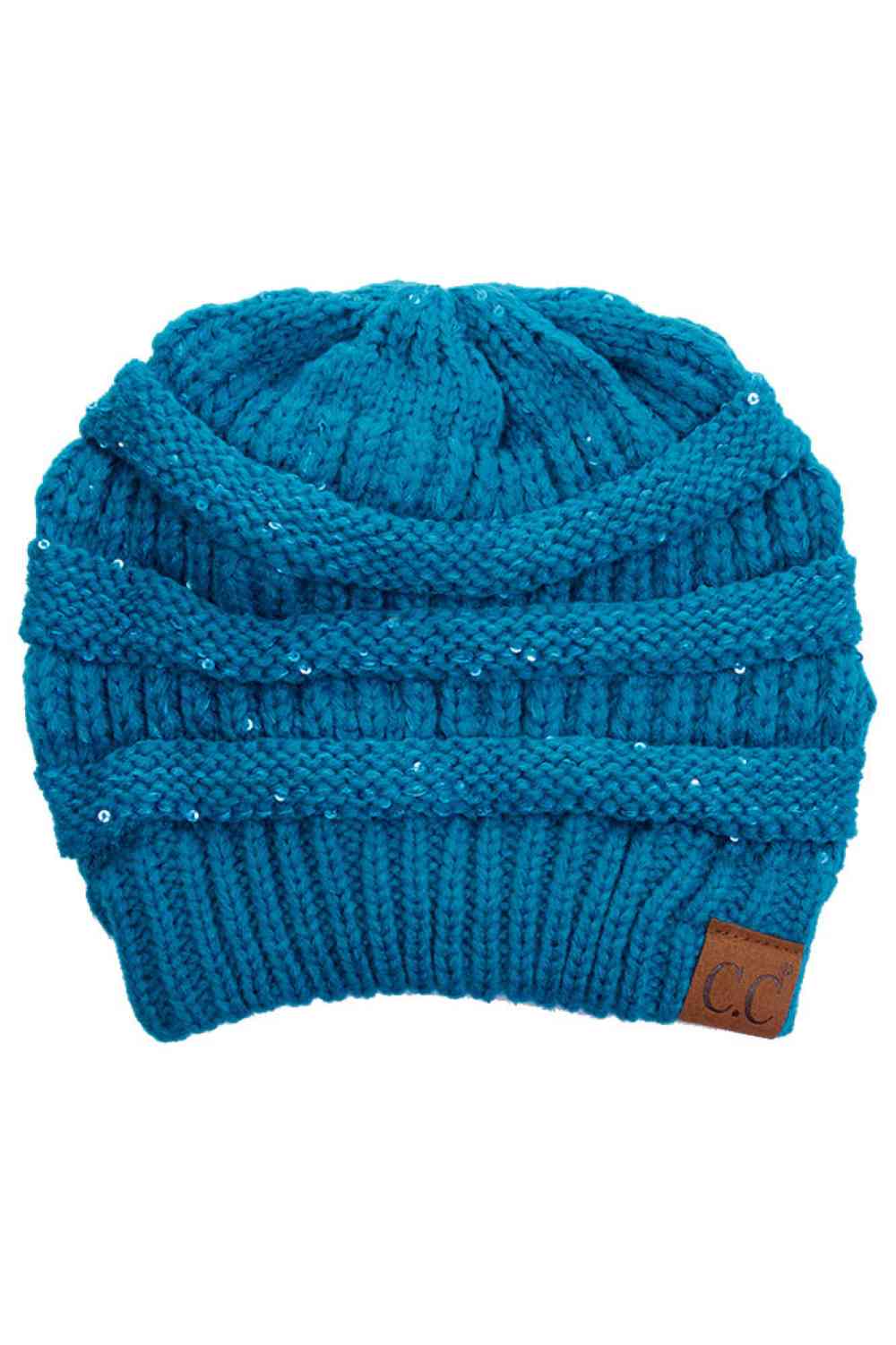 Teal Sparkle through the season with the C.C Sequin Knitted Soft Beanie, where style meets warmth. This cozy 100% acrylic beanie features eye-catching sequin detailing that adds a touch of glamour to your winter look. The soft, lightweight knit construction keeps you comfortable without bulk, perfect for layering or wearing solo. Whether you're heading out for casual errands or outdoor adventures, this versatile beanie transitions effortlessly from day to night. One size fits most for convenient, year-round