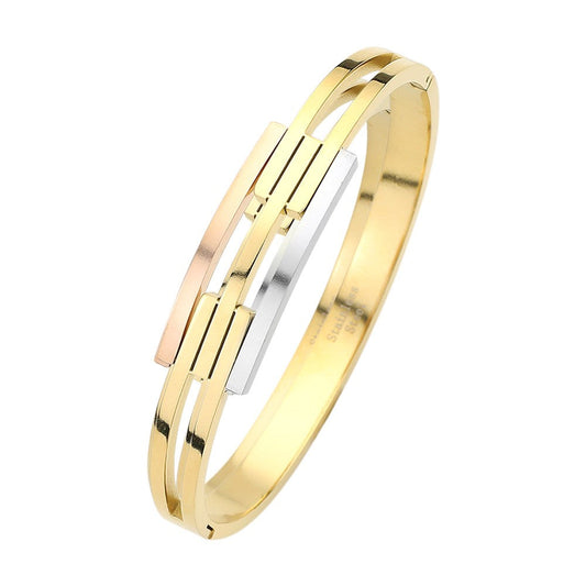 Three Tone Stainless steel three-tone hinged bangle bracelet is expertly crafted for a durable and stylish accessory. With its sturdy construction and three complementary tones, this bracelet is designed to add a touch of sophistication to any outfit. The hinged design allows for easy wear and removal, making it a convenient and versatile accessory.