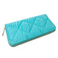 Turquoise Shiny Faux Leather Padded Wallet with Wristlet offers a sleek and stylish solution for storing your essentials. Its shiny faux leather material adds a touch of sophistication, while the padded design keeps your valuables safe. The attached wristlet also provides convenience and hands-free carrying. 