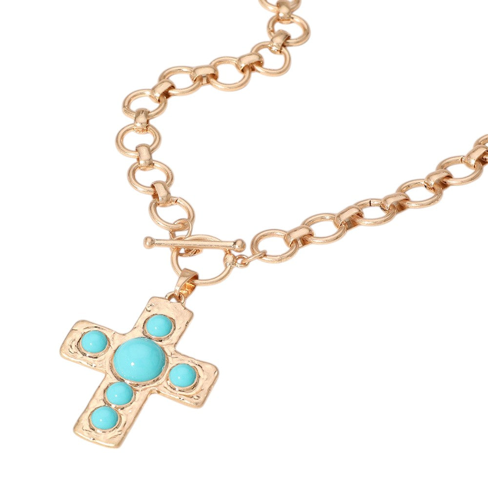 Turquoise Stone Cross Pendant Chunky Chain Necklace is the perfect accessory for adding a touch of bohemian style to any outfit. The stunning turquoise stone pendant adds a pop of color while the chunky chain brings a bold, statement-making look. Elevate your fashion game with this unique necklace. 