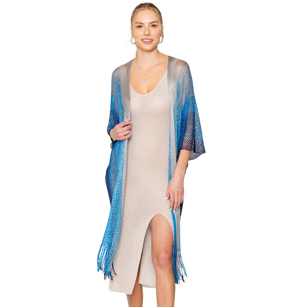 Turquoise Two Tone Lurex Kimono Poncho is a versatile and stylish addition to any wardrobe. Made with a unique Lurex fabric, it adds a touch of shimmer to your outfit. Its kimono design offers a comfortable and flattering fit, making it suitable for any body type. Perfect for adding a pop of color and sparkle to your outfit. 