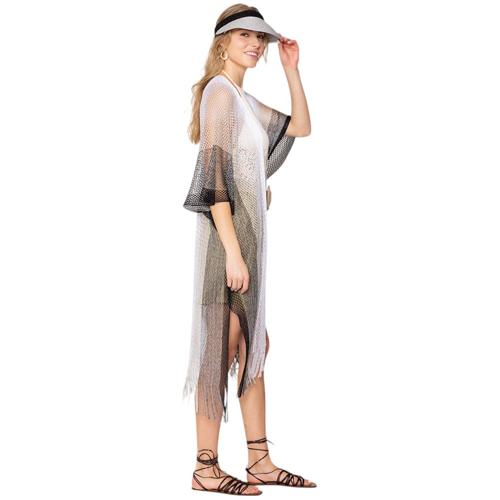 Black Two Tone Lurex Kimono Poncho is a versatile and stylish addition to any wardrobe. Made with a unique Lurex fabric, it adds a touch of shimmer to your outfit. Its kimono design offers a comfortable and flattering fit, making it suitable for any body type. Perfect for adding a pop of color and sparkle to your outfit. 