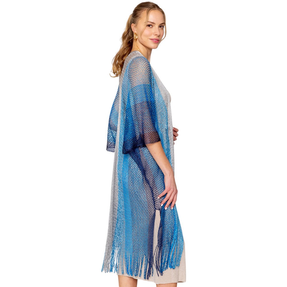Turquoise Two Tone Lurex Kimono Poncho is a versatile and stylish addition to any wardrobe. Made with a unique Lurex fabric, it adds a touch of shimmer to your outfit. Its kimono design offers a comfortable and flattering fit, making it suitable for any body type. Perfect for adding a pop of color and sparkle to your outfit. 