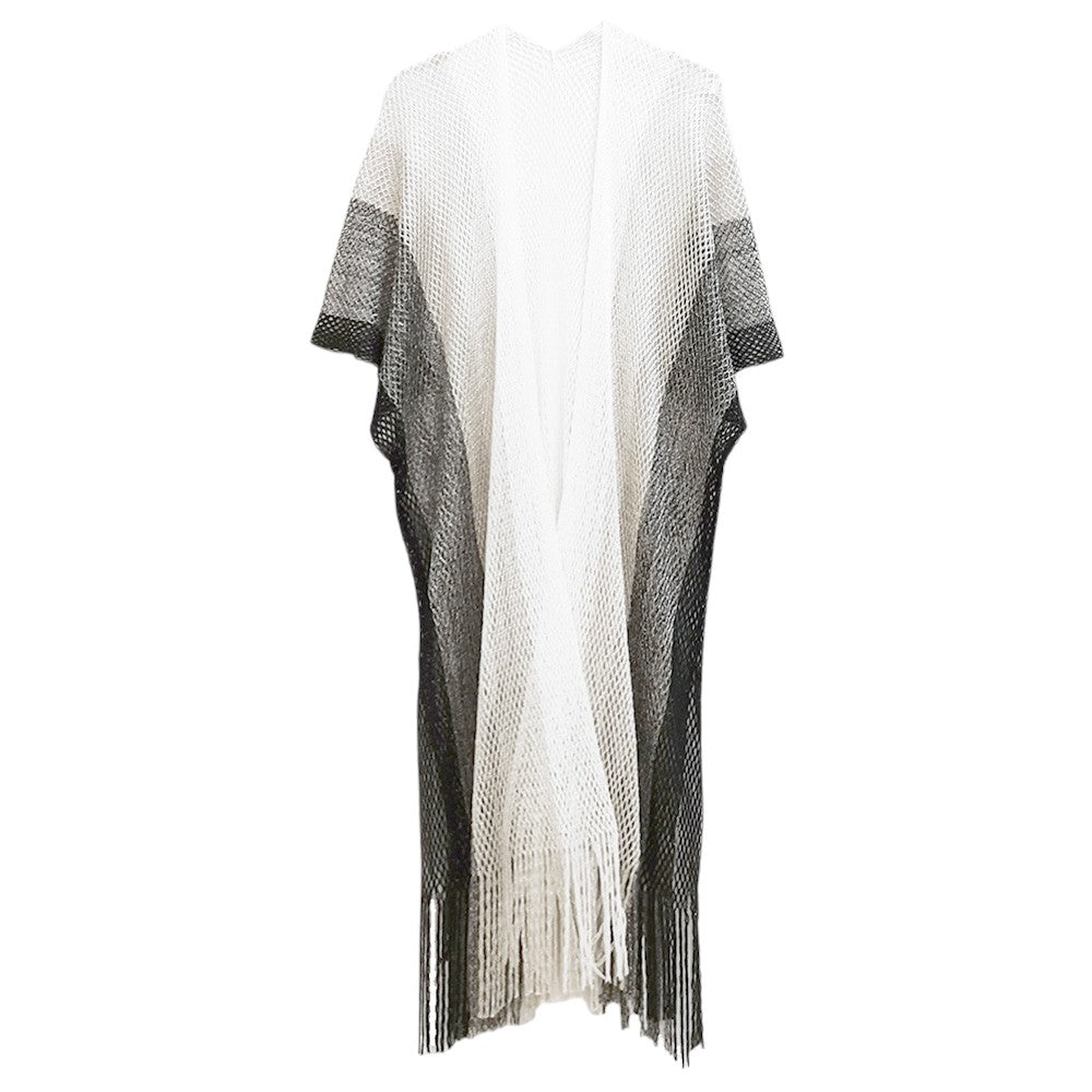 Black Two Tone Lurex Kimono Poncho is a versatile and stylish addition to any wardrobe. Made with a unique Lurex fabric, it adds a touch of shimmer to your outfit. Its kimono design offers a comfortable and flattering fit, making it suitable for any body type. Perfect for adding a pop of color and sparkle to your outfit. 