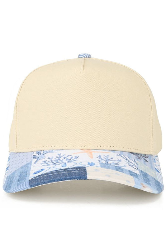Classic two-tone trucker hat featuring a striking nautical theme print along the brim. The mesh back panels provide breathability and comfort for all-day wear, while the structured front panels offer a polished look. Perfect for beach trips, casual outings, or anyone who loves coastal-inspired style. Adjustable closure ensures a secure fit for most head sizes.