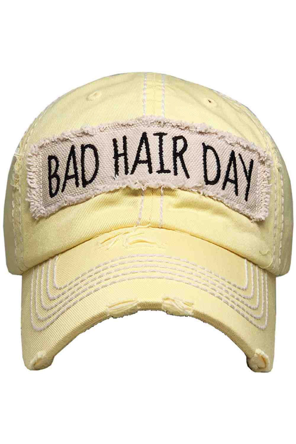 Vanilla Keep it casual and playful with the BAD HAIR DAY Washed Vintage Baseball Cap, featuring a relaxed, worn-in style that adds personality to any outfit. Designed with a classic curved brim and comfortable fit, it’s the perfect go-to accessory for effortless everyday wear.