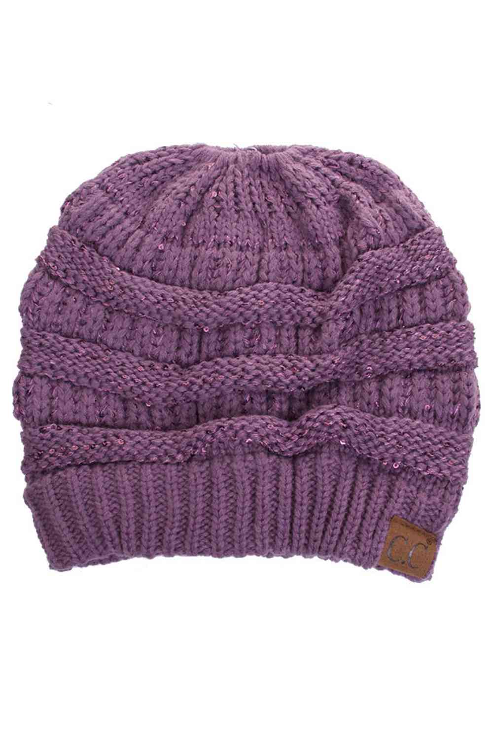 Violet Sparkle through the season with the C.C Sequin Knitted Soft Beanie, where style meets warmth. This cozy 100% acrylic beanie features eye-catching sequin detailing that adds a touch of glamour to your winter look. The soft, lightweight knit construction keeps you comfortable without bulk, perfect for layering or wearing solo. Whether you're heading out for casual errands or outdoor adventures, this versatile beanie transitions effortlessly from day to night. One size fits most for convenient, year-rou