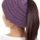 Violet The C.C Solid Color Ponytail Messy Bun Beanie combines comfort with versatility for effortless everyday style. Crafted from 100% soft acrylic, this beanie features an open crown design that accommodates ponytails and messy buns while keeping you warm. The one-size-fits-most construction ensures a secure, flattering fit for virtually anyone. Perfect for casual outings, workouts, or relaxed weekends, this practical accessory transitions seamlessly from season to season.
