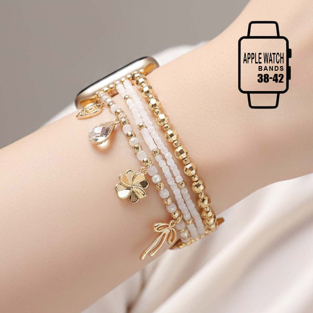 Madeline Love Gold, White Bow Clover Heart Cross Charm Dangle Floral Ceramic Ball Pearl Beaded Multi Layered Apple Watch Band - Watches